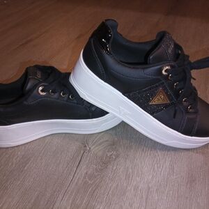 Black and White Sneakers with Gold Accents